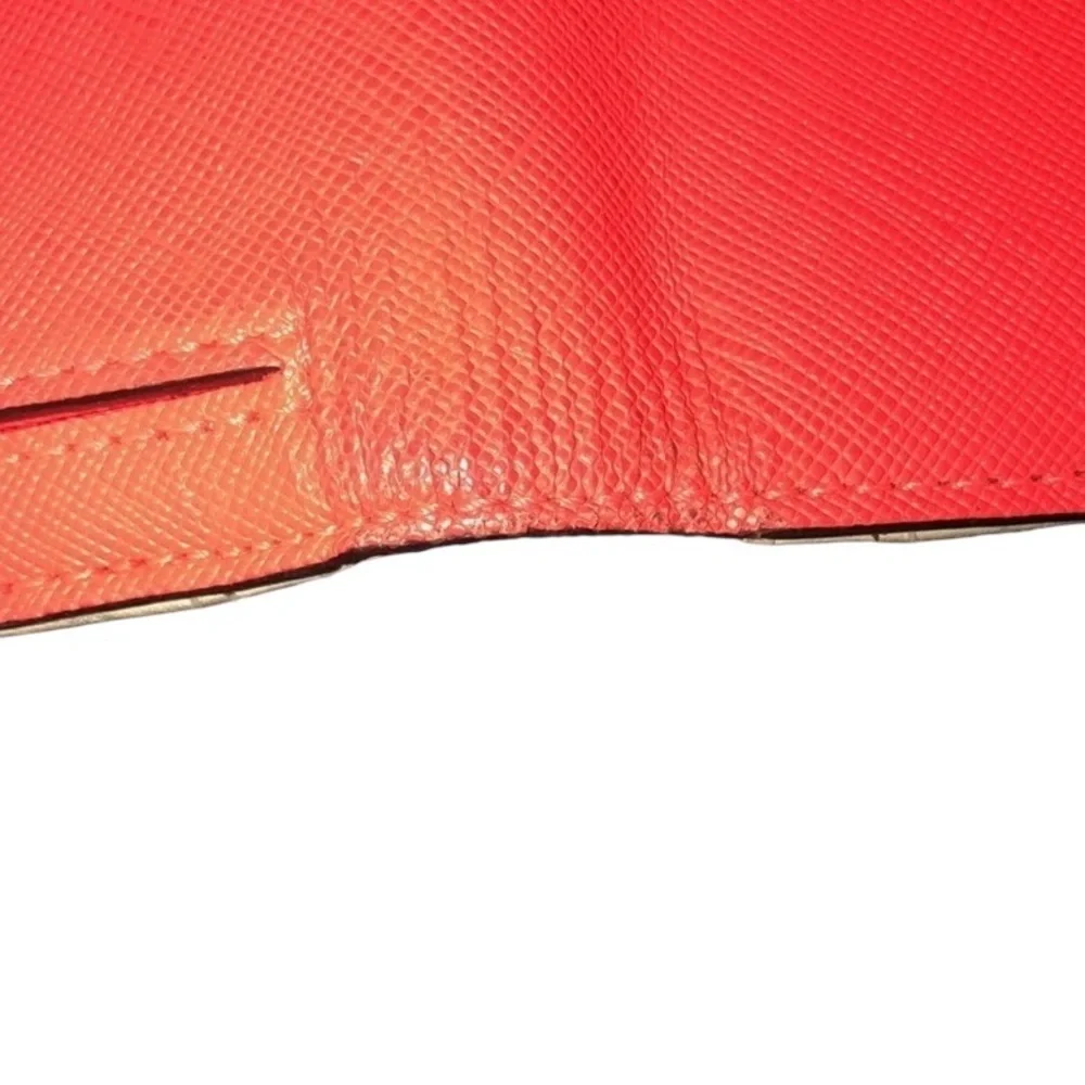 Kate Spade orange wristlet mobile case wallet genuine leather lots of slots